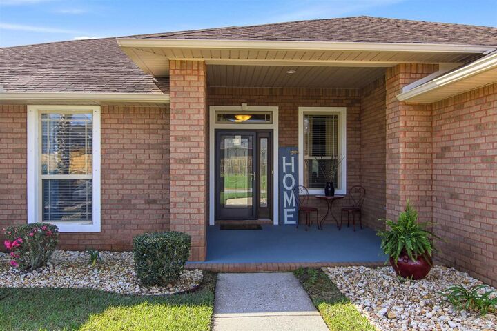 Property Photo:  5808 Dunridge Dr  FL 32571 