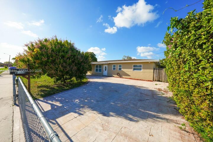 Property Photo:  5511 NW 180th Ter  FL 33055 