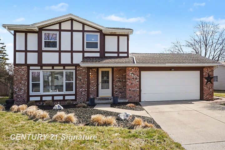 Property Photo:  680 N Frost Drive  MI 48638 