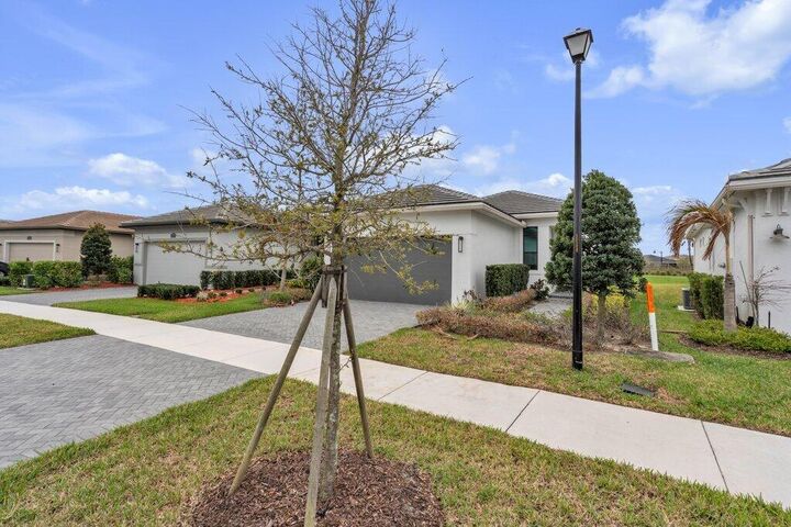 Property Photo: 9399 SW Pepoli Way FL 34987