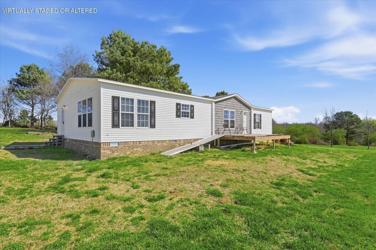 Property Photo:  1546 Co Rd 407  AL 35765 