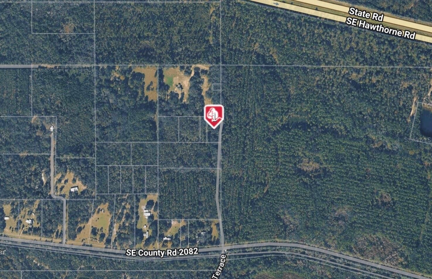 Property Photo:  10702 SE County Road 2082  FL 32641 