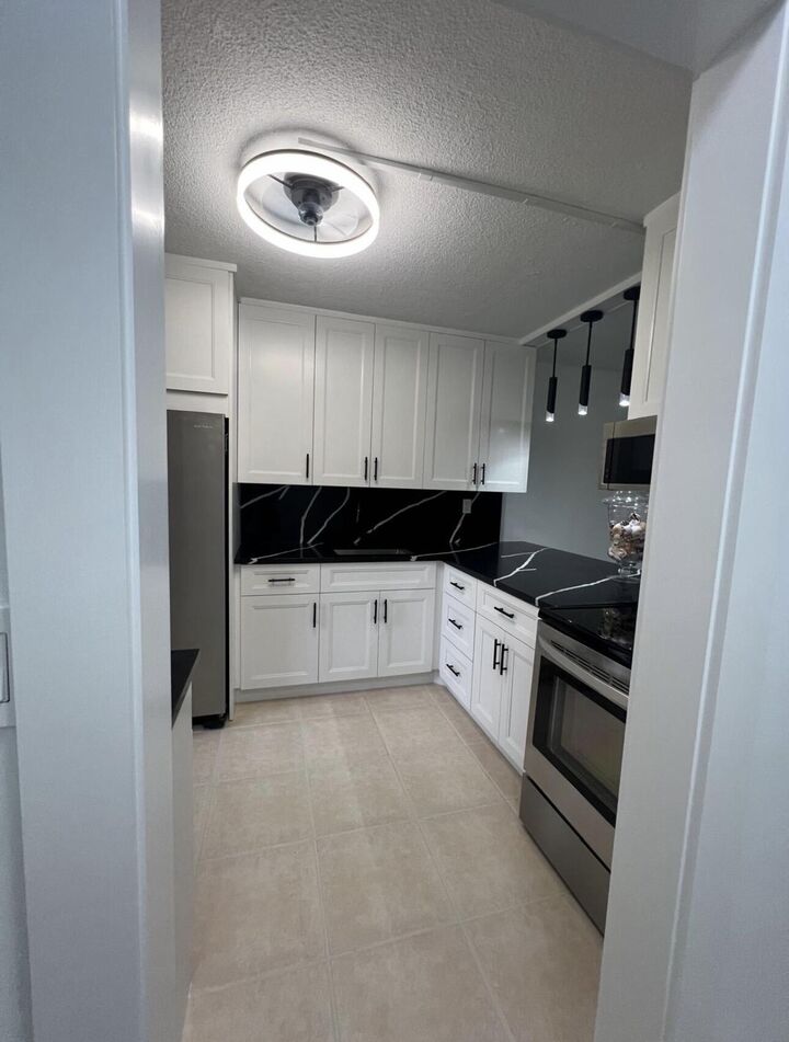 Property Photo:  2615 Garden Drive N 104  FL 33461 