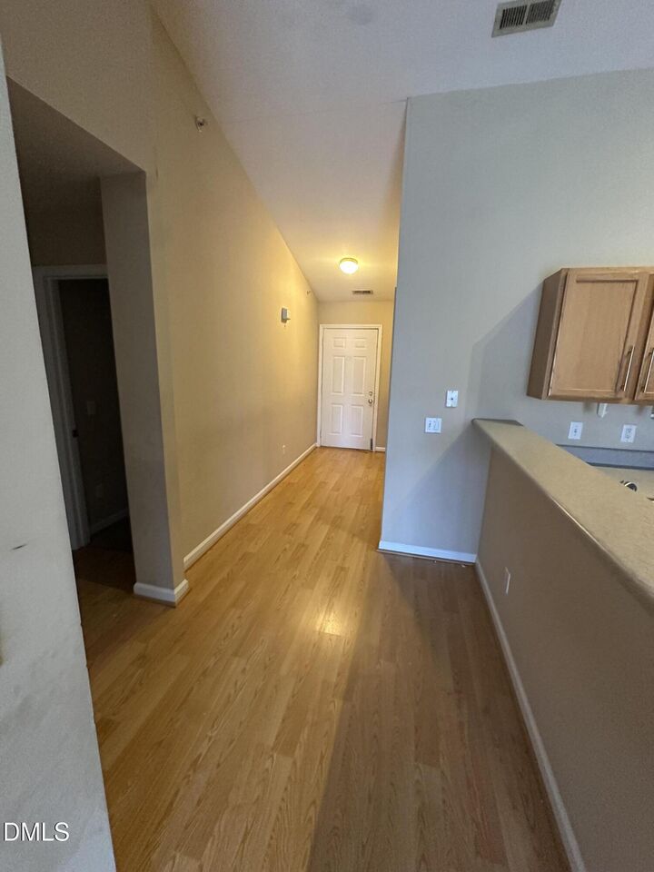 Property Photo:  1901 Trailwood Heights Lane 302  NC 27603 