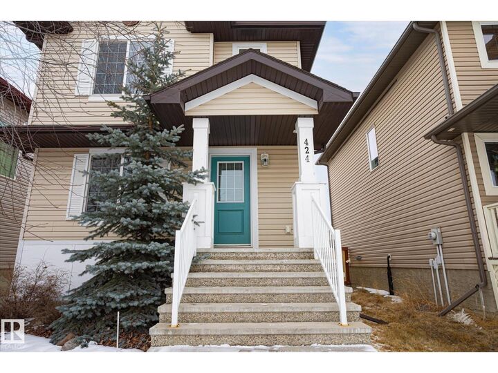 Property Photo: 424 Songhurst Pl AB T9E 0P9