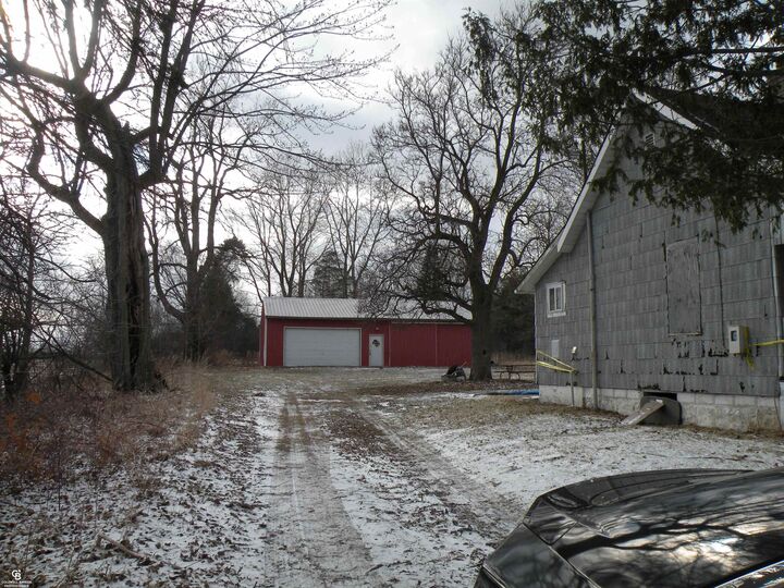 Property Photo:  7627 Emmett Road  MI 48097 