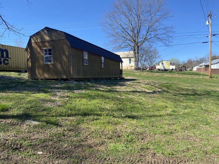 Property Photo:  115 4th St  TN 37020 