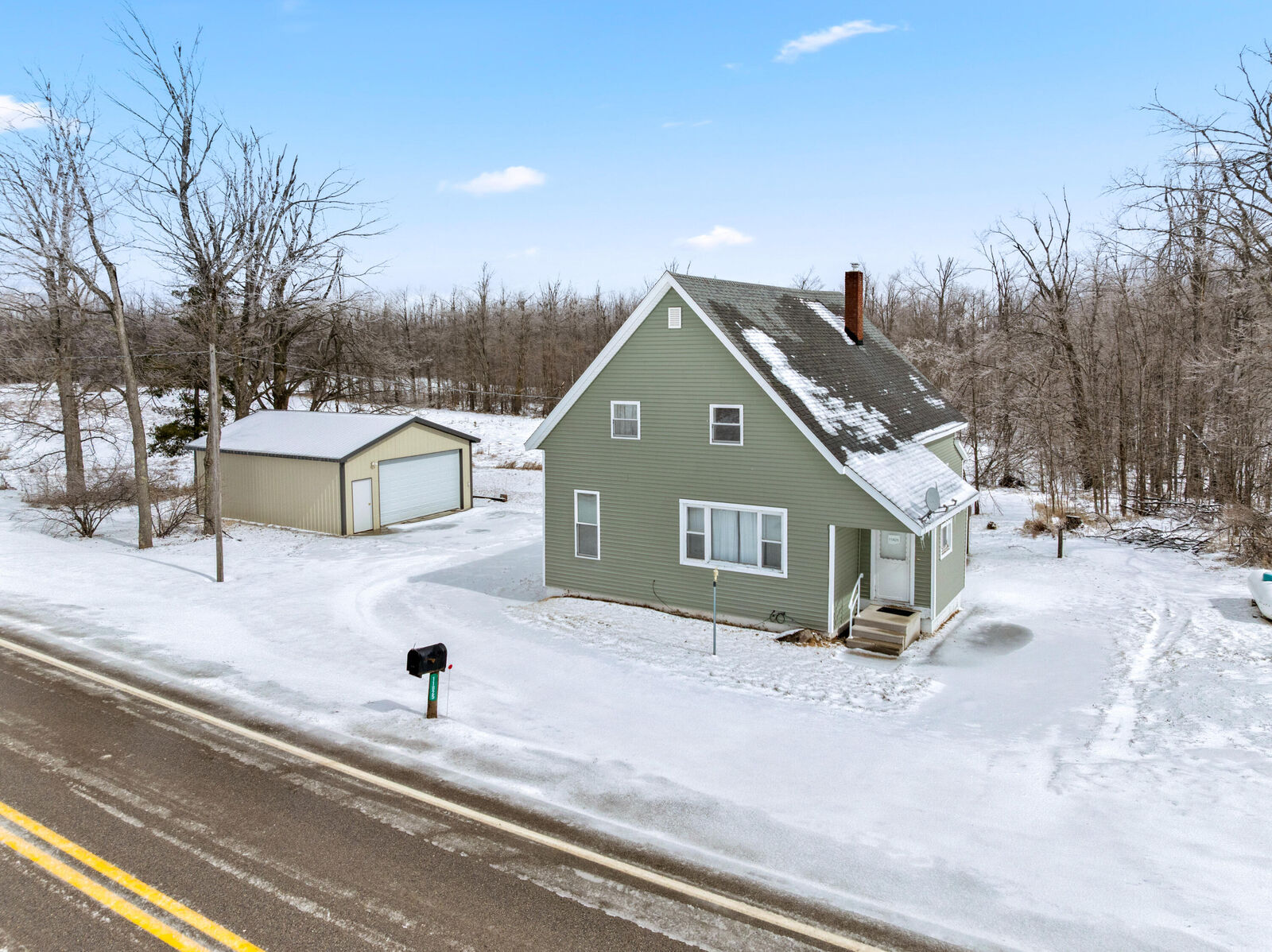 Property Photo:  11825 Meridian Line Road  MI 49751 