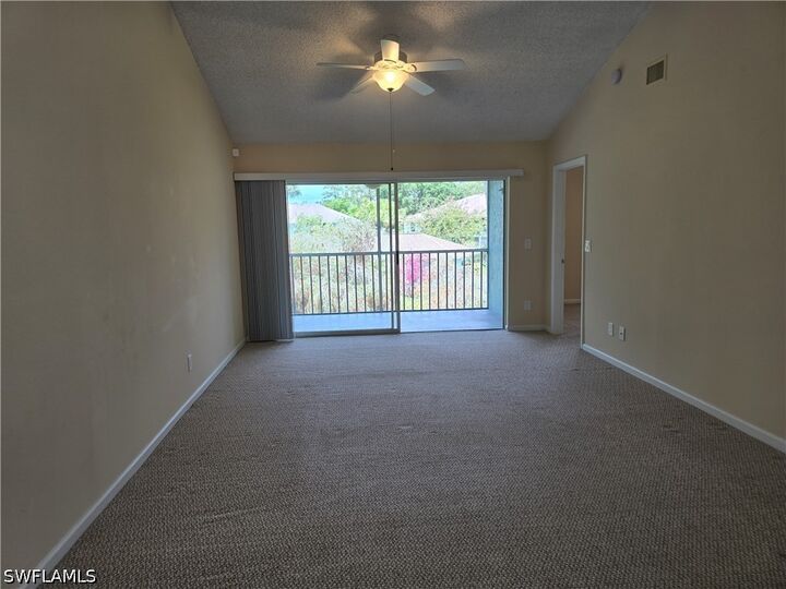 Property Photo:  5741 Whitaker Road D-203  FL 34112 