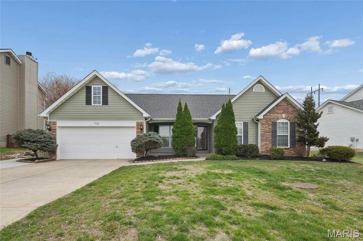 Property Photo:  710 Longfellow Circle  MO 63366 