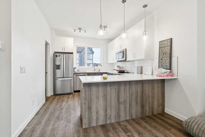 Property Photo: 850 Belmont Drive SW 403 AB T2X 4A6