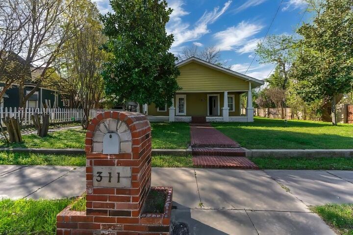 Property Photo:  311 W Spring Street  TX 76086 