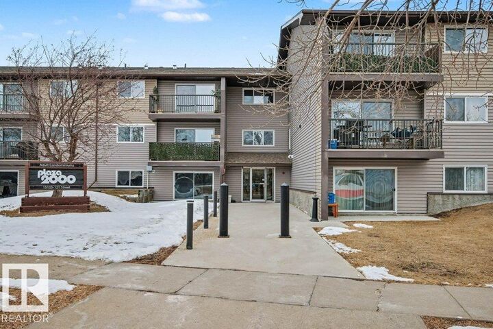 Property Photo: 15105 121 Street NW 102 AB T5X 2G3