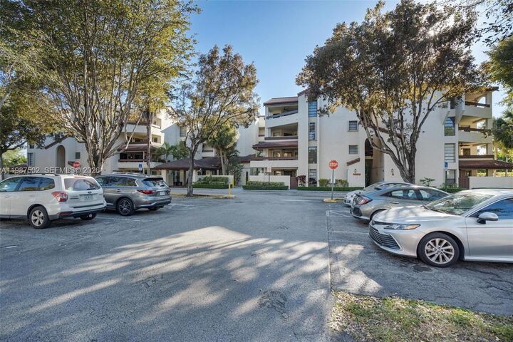 Property Photo:  9040 SW 125th Ave D408  FL 33186 