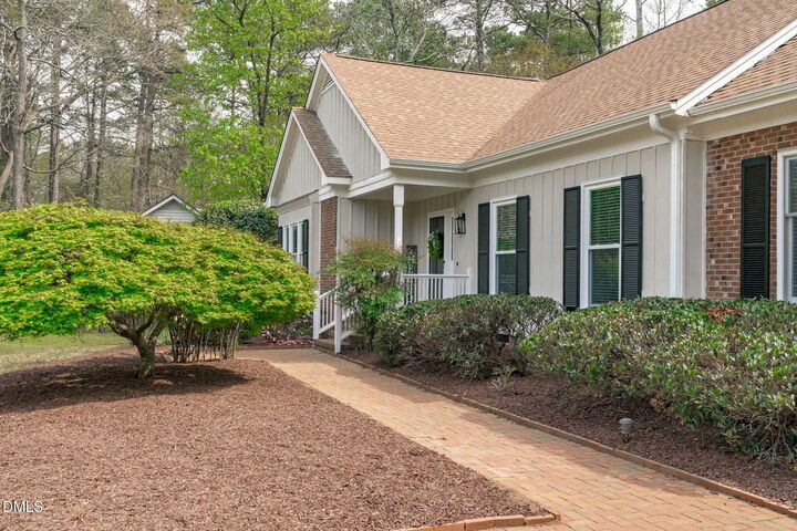 Property Photo:  100 Planters Wood Lane  NC 27518 
