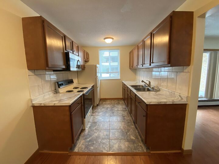 Property Photo:  521 19th Street NW 15  MN 55901 