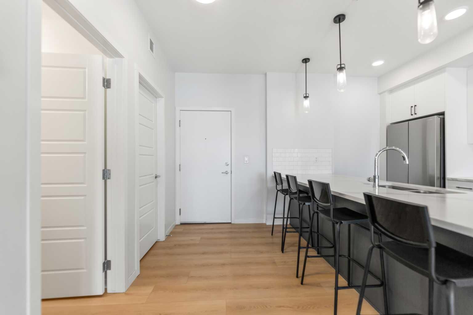 Property Photo: 20295 Seton Way SE 6403 AB T3M 3Y7