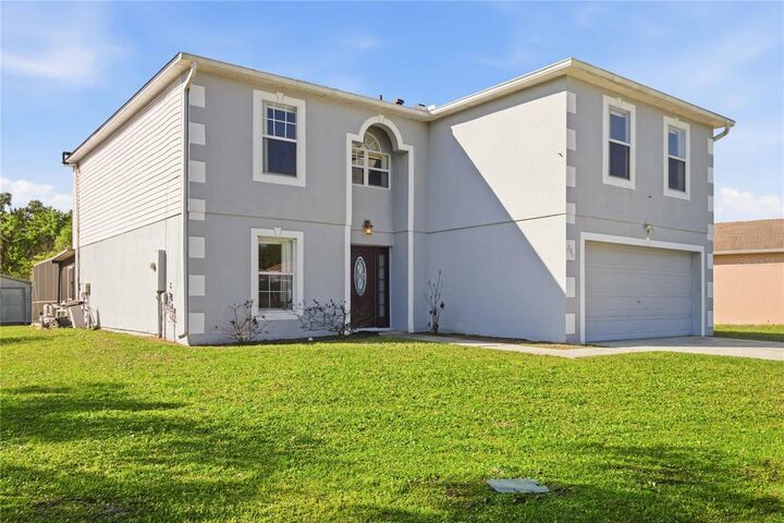 Property Photo: 206 Taranto Way FL 34758