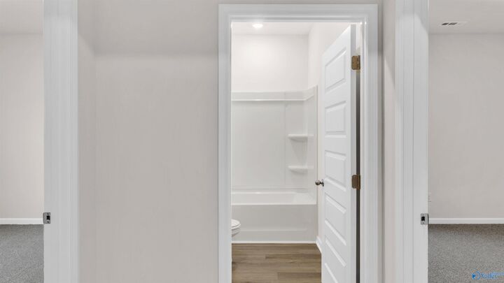 Property Photo: 6143 Feather Way SE AL 35763