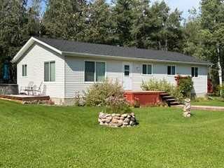 Property Photo: 454038 Range Road 53 AB T0C 2X0