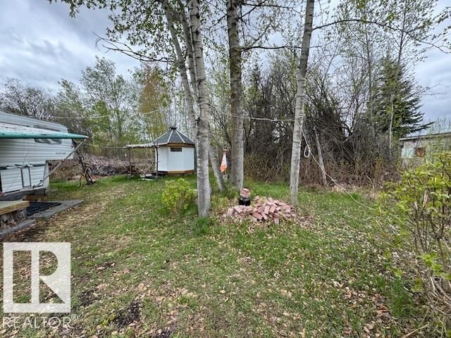 Property Photo: 321 254053 Twp Rd 460 AB T9A 1W8