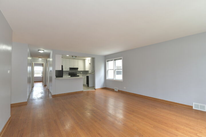 Property Photo:  4914 Louise Street 1  IL 60077 