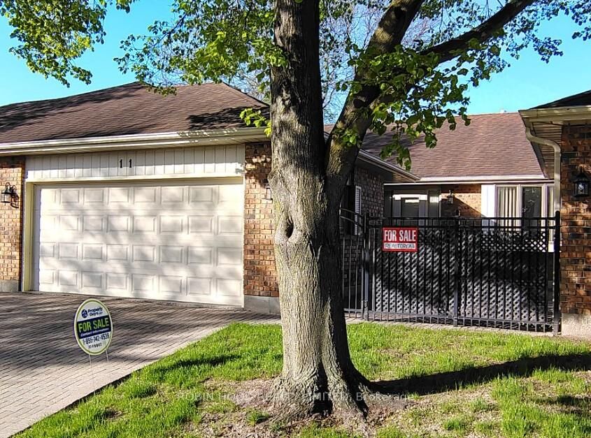 Property Photo: 21 Earl Drive Unit 11 ON N7M 6E6