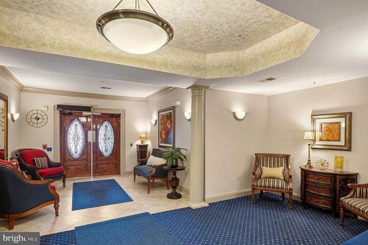 Property Photo:  8605 Wandering Fox Trail 203  MD 21113 