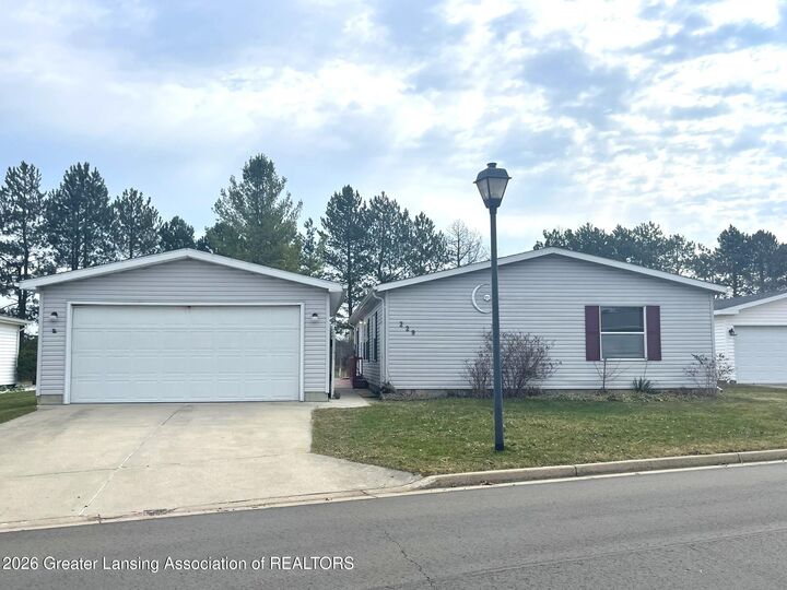 Property Photo: 229 Cadgewith East MI 48906