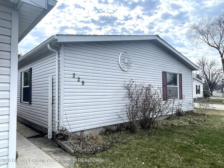 Property Photo:  229 Cadgewith East  MI 48906 