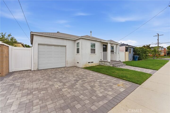 Property Photo:  16407 Santa Ana Avenue  CA 90706 