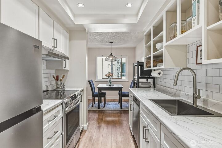 Property Photo:  18906  8th Avenue NW 213  WA 98177 