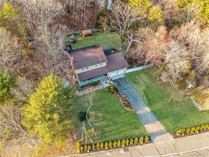 Property Photo: 231 W Woodside Avenue NY 11772