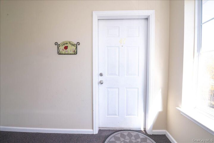 Property Photo:  6 Danica Way 7-47  NY 12754 