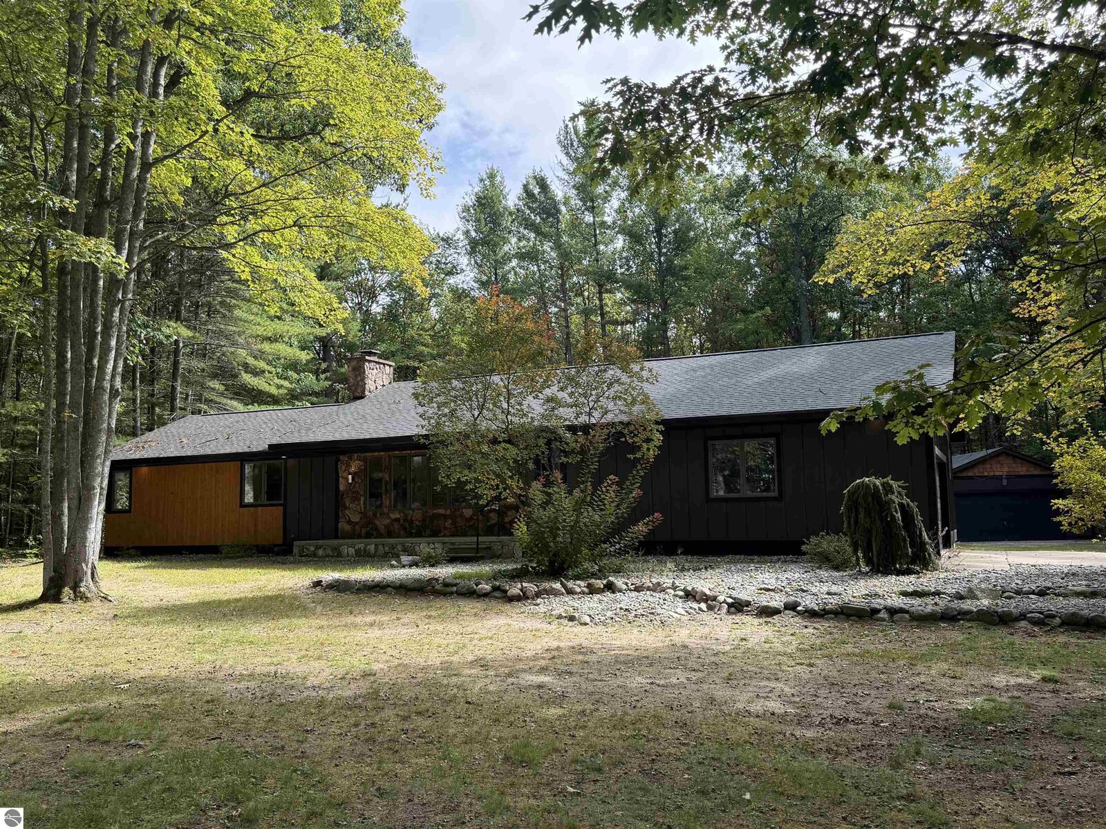 Property Photo: 10852 NE Black Bear Road MI 49646