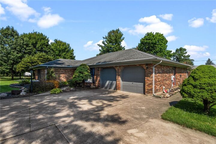 Property Photo:  1323 W State Route 571  OH 45371 