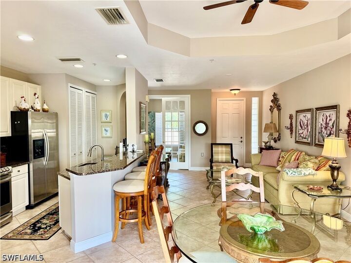 Property Photo:  1390 Sweetwater Cove 203  FL 34110 