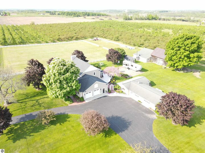 Property Photo:  10215 Elk Lake Road  MI 49690 