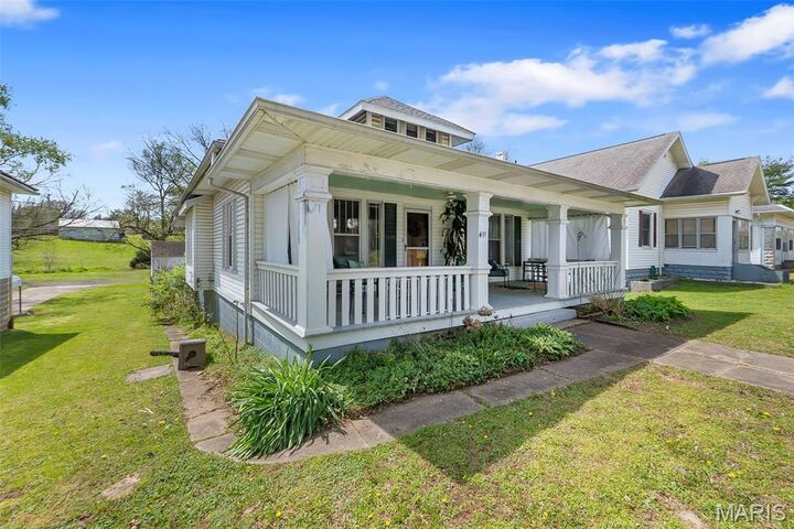 Property Photo:  411 E Maple Street  MO 63780 