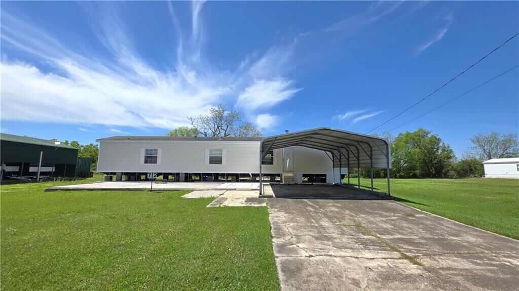 Property Photo:  712 Buras River Road  LA 70041 