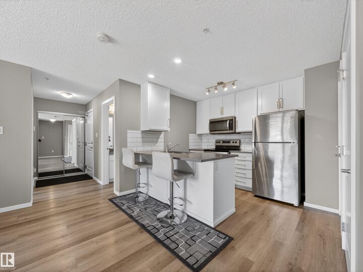 Property Photo: 148 Ebbers Boulevard NW 124 AB T5Y 4A4
