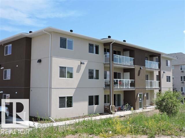 Property Photo: 1601 8 Avenue 2103 AB T9M 0J9