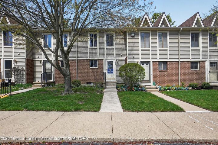 Property Photo:  5966 Village Drive  MI 48840 