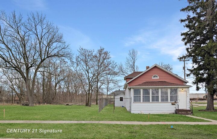 Property Photo:  1621 Carroll Street Road  MI 48601 