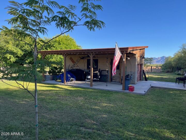 Property Photo: 9115 W Broadway Road AZ 85353