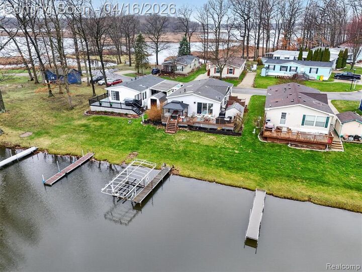 Property Photo:  11542 Clearwater Dr  MI 48430 