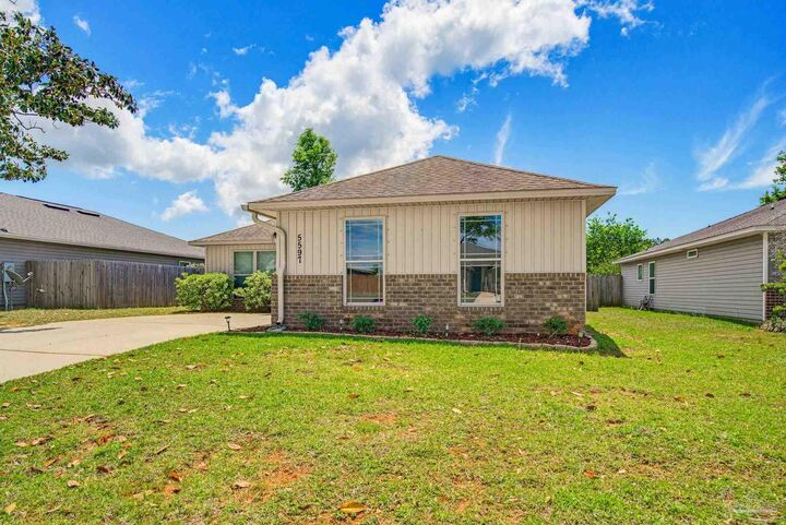 Property Photo:  5597 Peach Dr  FL 32571 