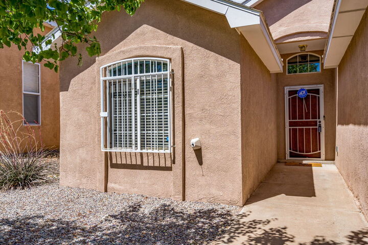 Property Photo:  6815 Calle Cielo SW  NM 87121 
