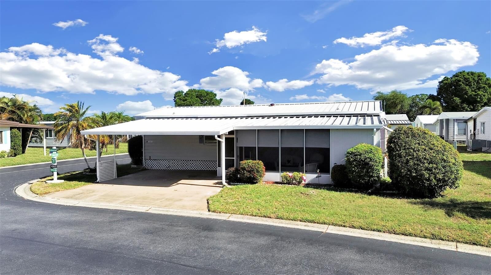 Property Photo:  12501 Ulmerton Road 77  FL 33774 