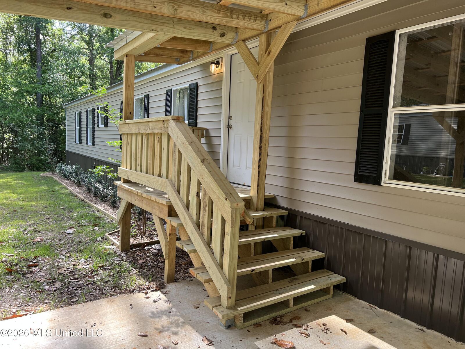 Property Photo:  9738 Limu Place  MS 39525 